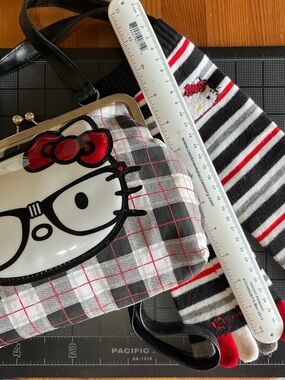Hello Kitty Cross Body Bag by Loungefly and Toe Sox by Sanrio-Good to Fair cond